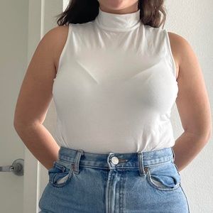 WHITE SLEEVELESS TURTLENECK FROM CHICO’s